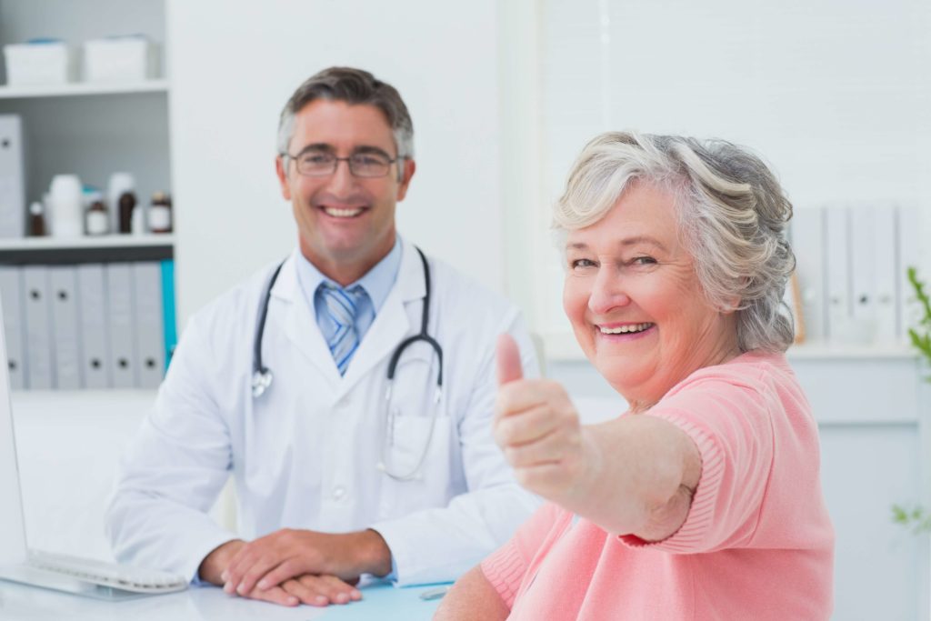Woman excited for value based care physician performance.