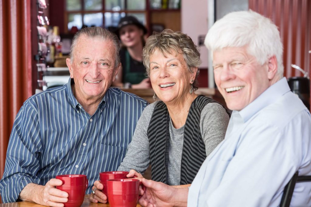 Smiling seniors enjoying enhanced life